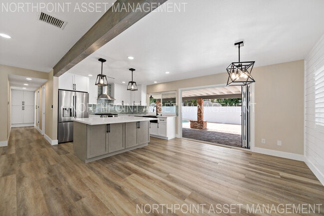Building Photo - Brand New Remodel – Stunning Pool Home wit...