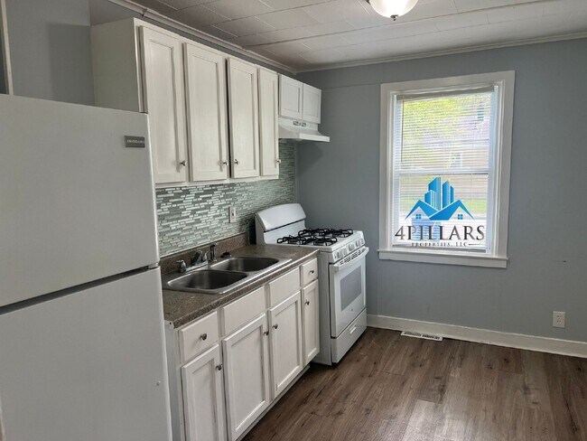 Building Photo - Charming 2 Bedroom Duplex in La Porte with Spacious Layout and Prime Location