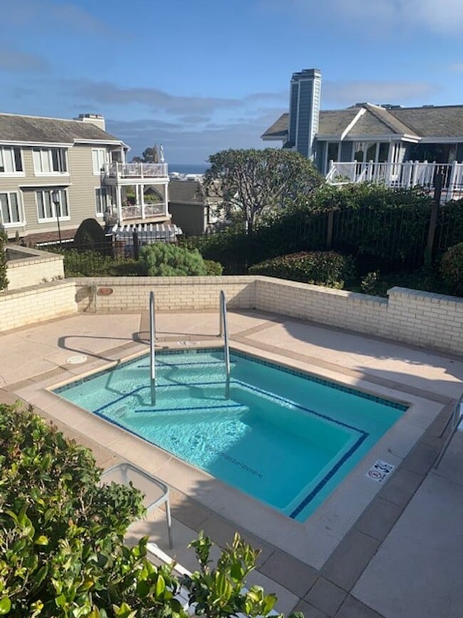 Building Photo - Perched above the stunning Dana Point Harbor, this gorgeous two-story condo offers breathtaking h...