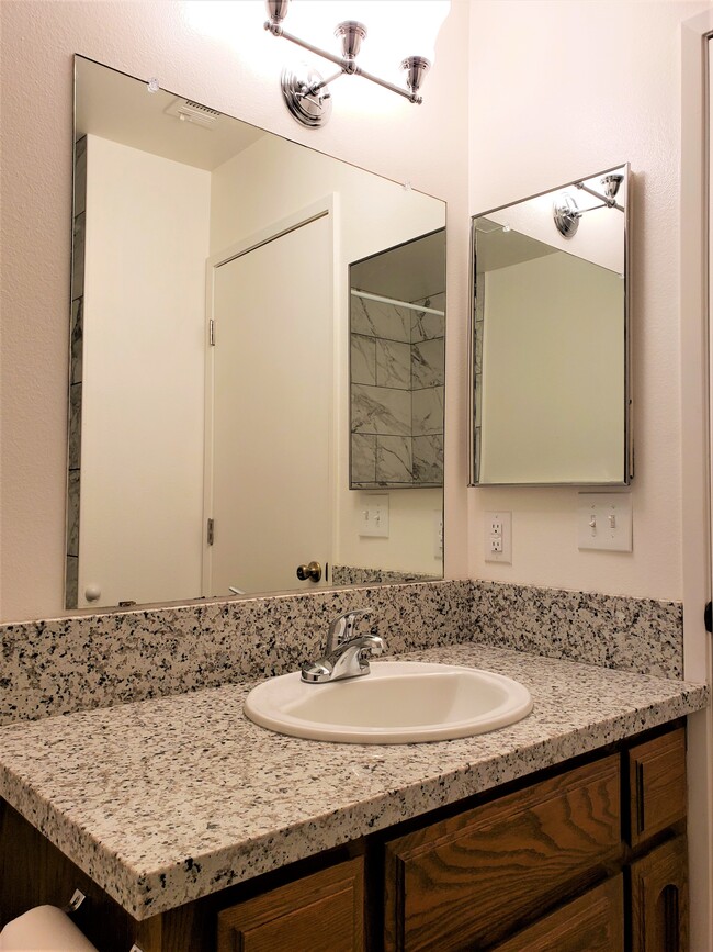 Hall Bath Sink and Granite Counter - 4617 N Charles Ave