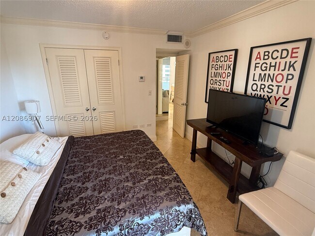 Building Photo - 5555 Collins Ave