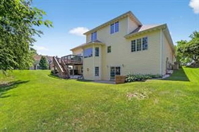 Building Photo - Spacious 5-Bed Walkout Home with Over 3,50...