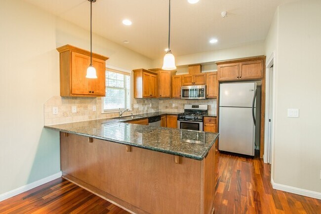 Building Photo - Spring Into Your New Home - Premium Corner Townhome Now Available!