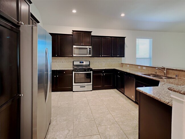 Building Photo - 21614 Champagne Dr E