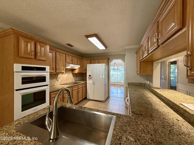 Building Photo - 2217 Hammock Oaks Dr N