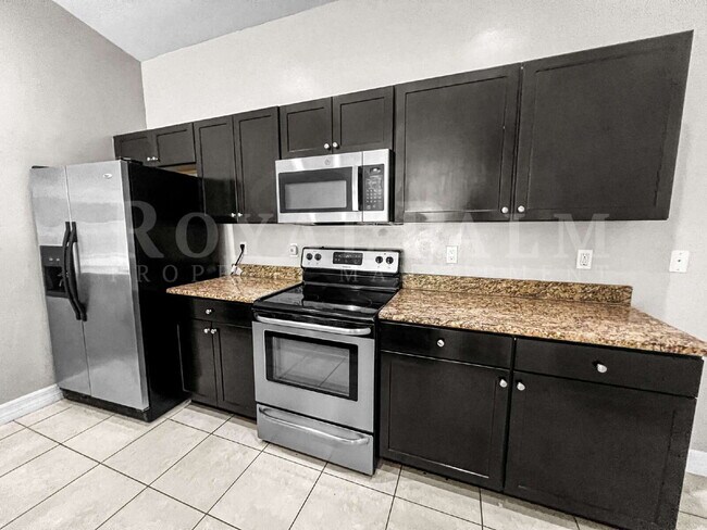 Building Photo - 3BR/2BA Cape Coral Rental - Washer... Dryer... Screened Lanai... This One Came Prepared