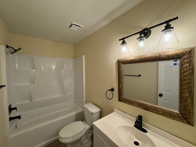Building Photo - Introducing a newly renovated town-home "A...