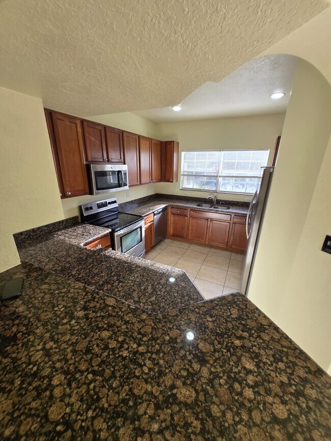 Building Photo - 4701 Cohune Palm Ct