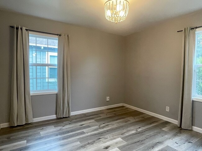 Building Photo - Bright, Updated Home with Garage, Laundry, and Private Yard