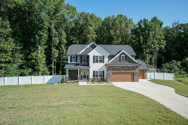 Building Photo - Stunning 4-Bedroom Home with 3-Car Garage ...