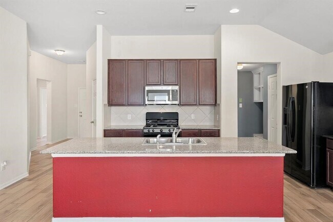 Building Photo - 8218 Pastel Dawn Trce
