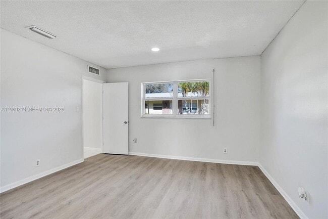 Building Photo - 2621 SW Natura Ave