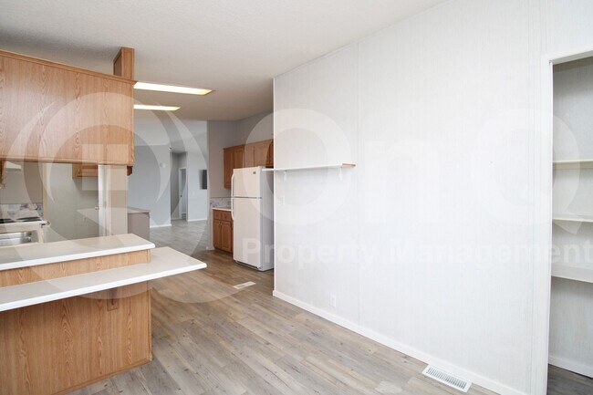 Building Photo - 9721 E Empress Ave