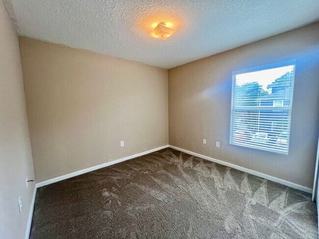 Building Photo - Gated Comfort Condo, Poolside Vibes: Your Next Home Awaits at Merrill Pines