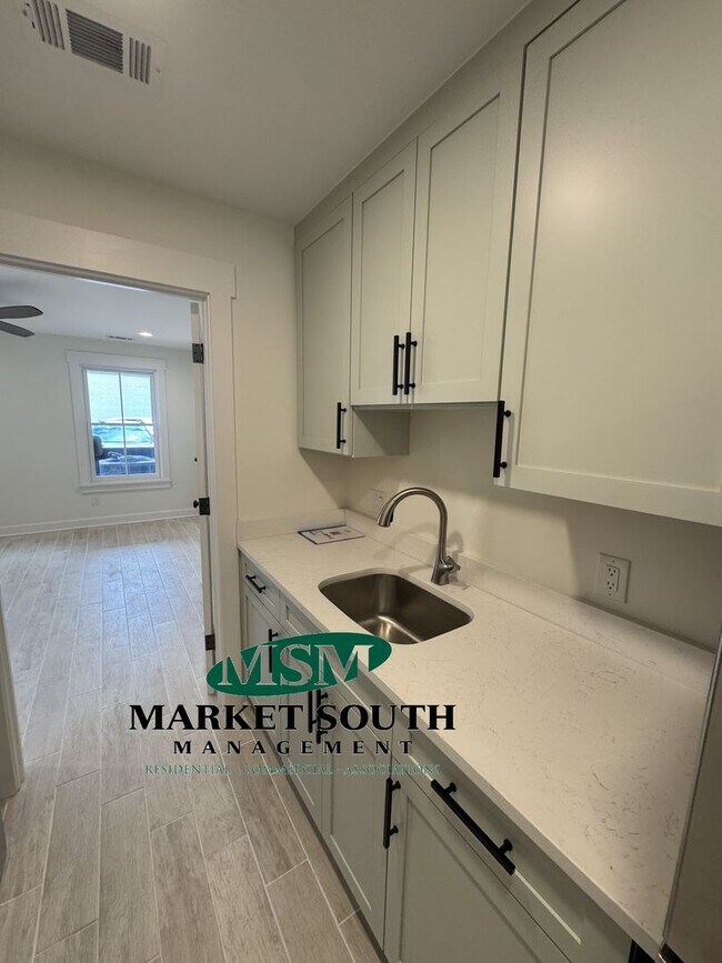 Building Photo - **APPLICATION PENDING! GORGEOUS NEW CONSTR...