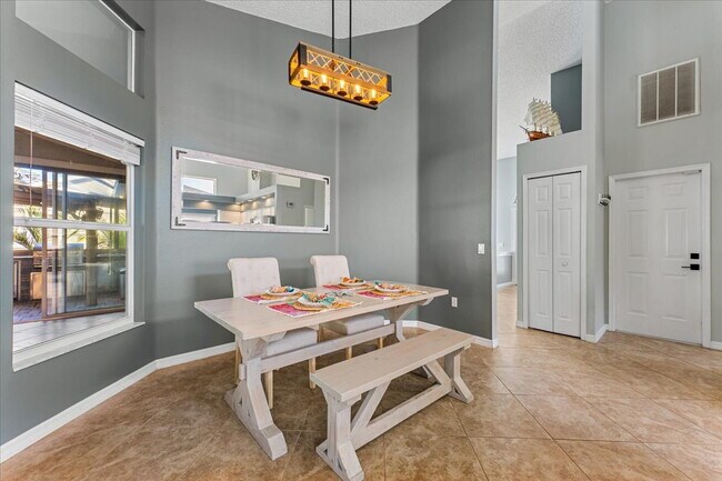Building Photo - A vibrant 2-bedroom, 2-bathroom tropical retreat designed for both high-energy entertaining and l...