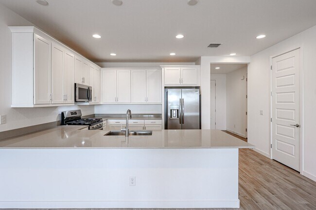 Building Photo - COMING SOON!! Recently built 5-Bedroom Home in Goodyear with Upgrades & Resort-Style Amenities