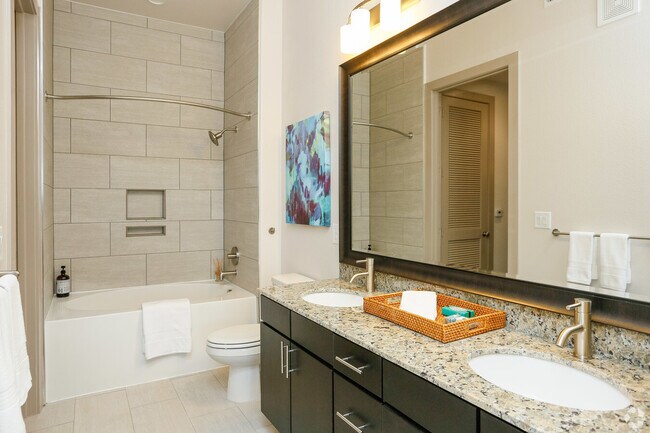 Building Photo - Making Midtown Buzz — Live in Style Today!