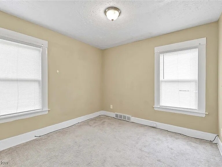 Building Photo - 10409 Ostend Ave