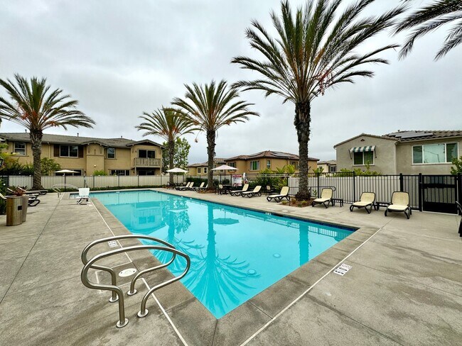 Building Photo - SD: Spacious 4BD/3.5BA Townhome in Oceanside with Community Pool, 2-Car Garage & Covered Balcony