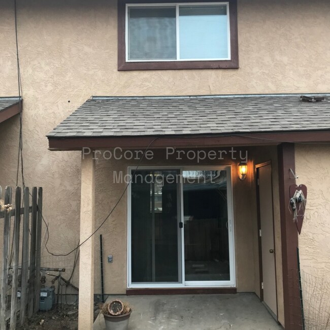 Building Photo - $1300...2Bed 1.5 Bath, Small Fenced in Covered Patio on Back, Storage