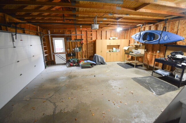 Building Photo - 3-Bedroom NE Rochester home with Sunroom, Fenced Backyard & Attached Garage