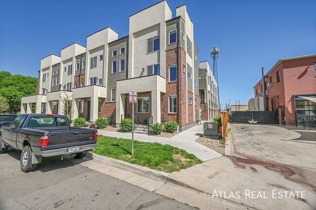 Building Photo - 7035 E 38th Ave