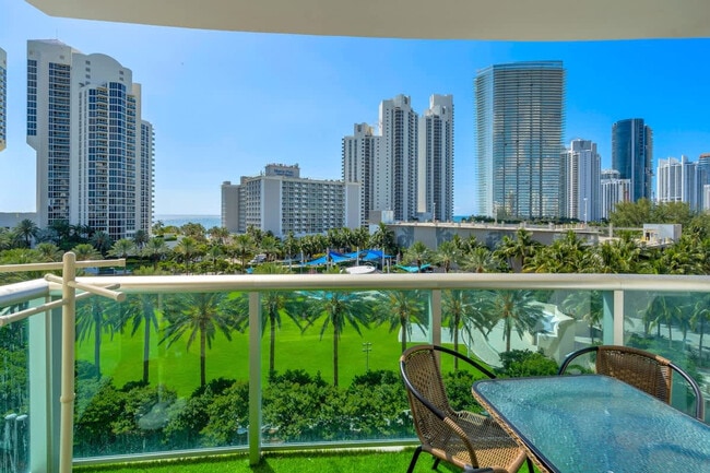 Building Photo - 19370 Collins Ave