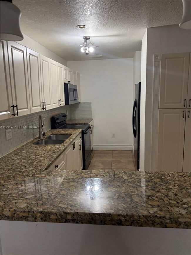 Building Photo - 4386 W 10th Ave