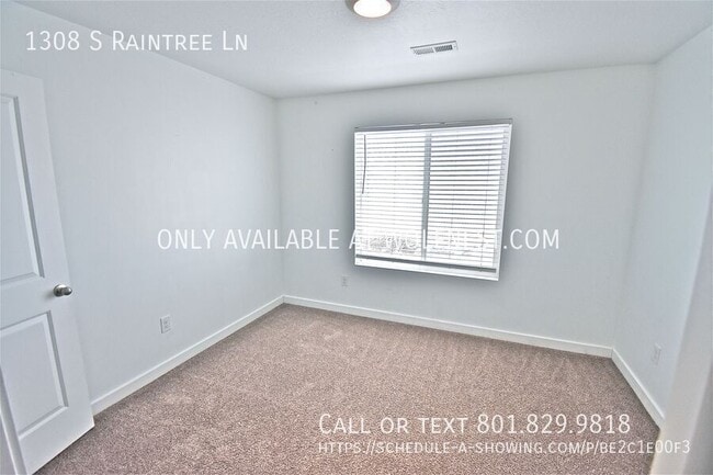 Building Photo - 1308 S Raintree Ln