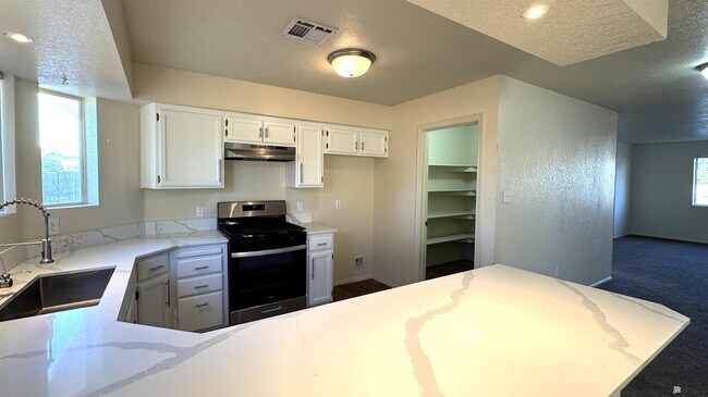 Building Photo - 8573 E 25th St