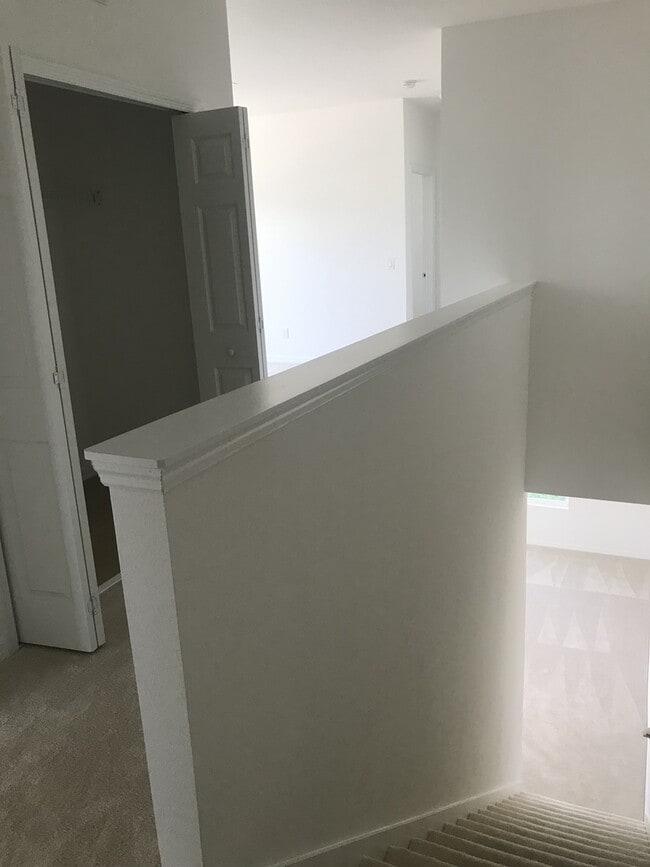 Building Photo - TWO BEDROOM TOWNHOUSE WITH LOFT AND PRIVTE...