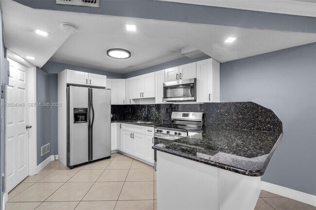Building Photo - 5335 W 23rd Ct