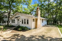 Building Photo - The Nautical Nest | Cozy Lakeside Retreat ...