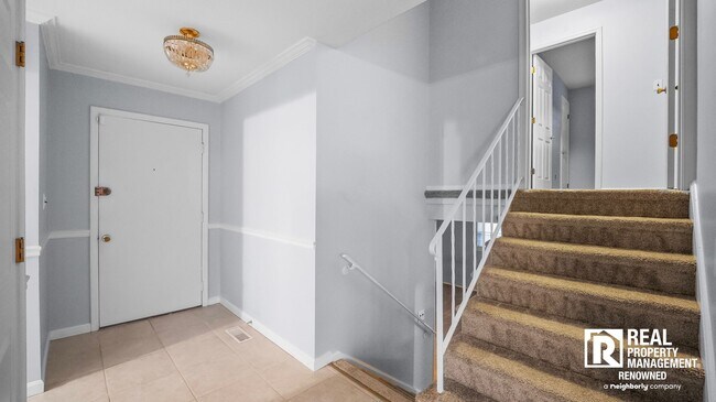 Building Photo - Lovely 4 BR/2.5 BA Split-level in Quite Ne...