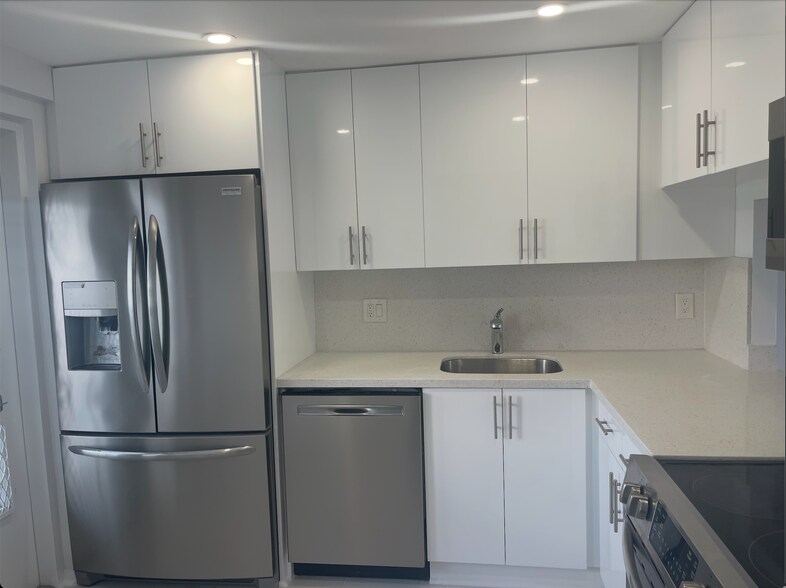 Renovated Kitchen with plenty of storage - 3181 S Ocean Dr