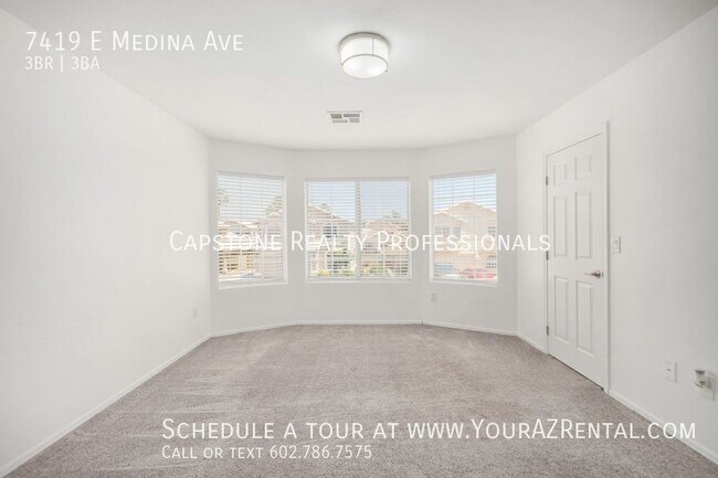 Building Photo - 7419 E Medina Ave