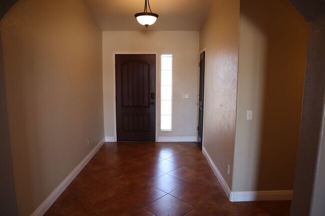 Building Photo - Home With A Pool and Much More!