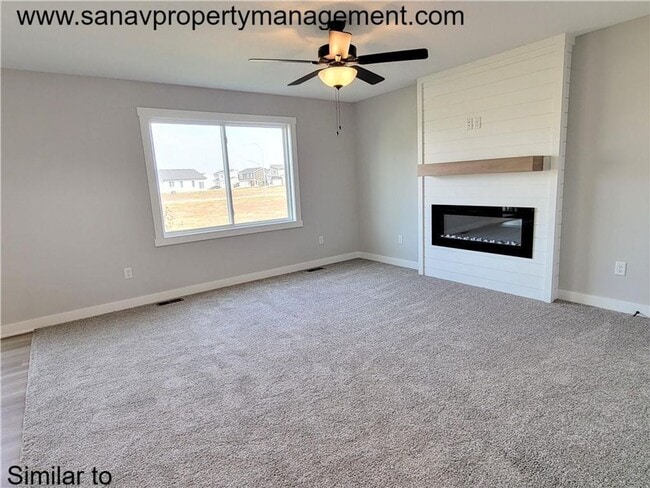 Building Photo - Spacious 4-Bedroom Home in Bondurant for R...