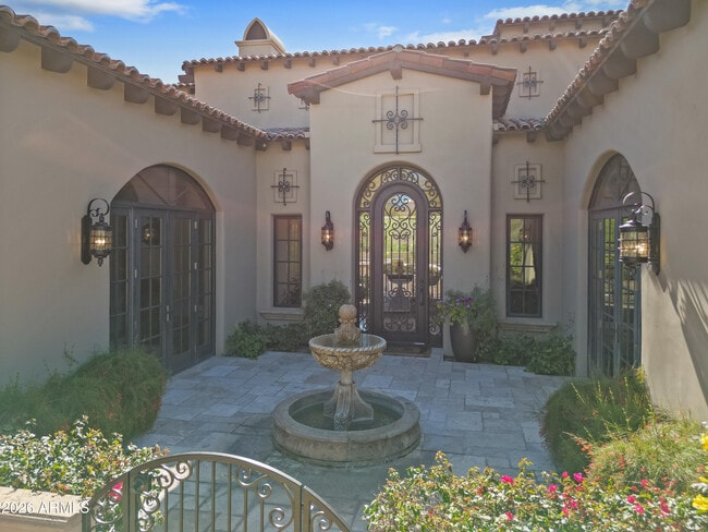 Building Photo - 9290 E Thompson Peak Pkwy