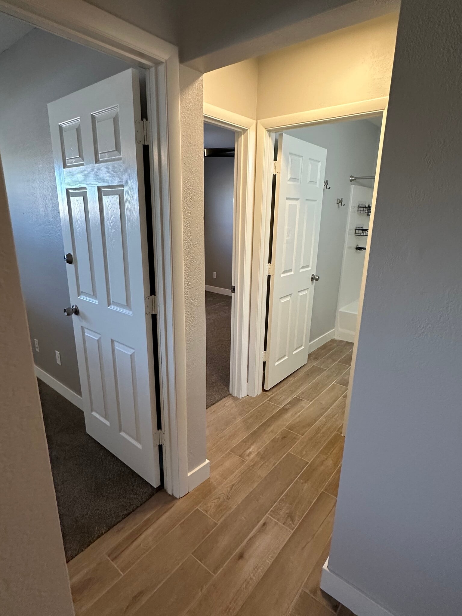 Hallway to Primary Room, Guest Room 1, Guest Bath, and Linen Closet - 2513 N 28th St
