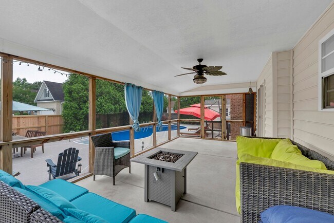 Building Photo - Beautiful brick home with a saltwater pool