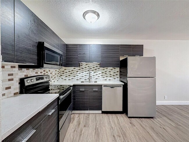 Building Photo - 1800 NW 52nd Ave