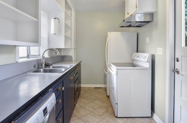 Building Photo - Classic single story house with furnished basement. Near Interurban trails and Jackson Golf course.