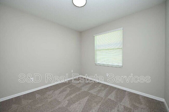 Building Photo - 5507 Freesia Dr