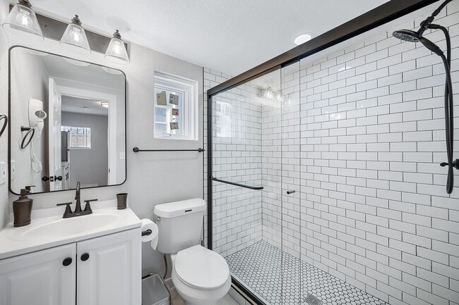 Building Photo - Remodeled and Furnished 1BD, 1BA in the Highlands with Off-Street Parking Spot