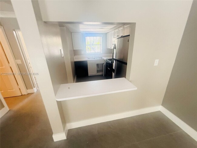 Building Photo - 10787 Royal Palm Blvd
