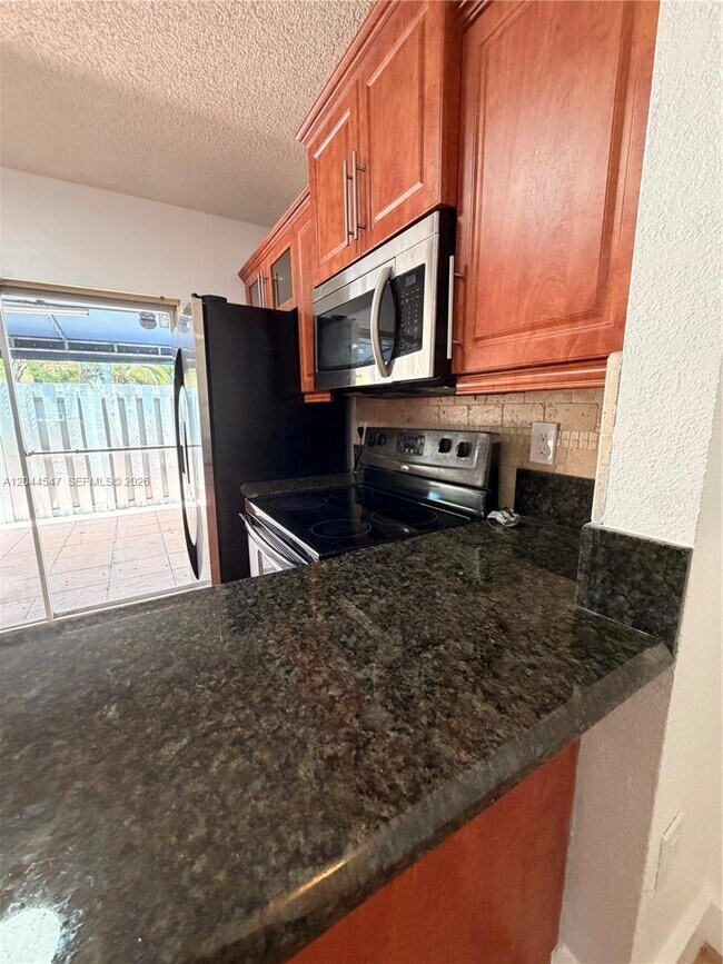Building Photo - 7000 NW 173rd Dr