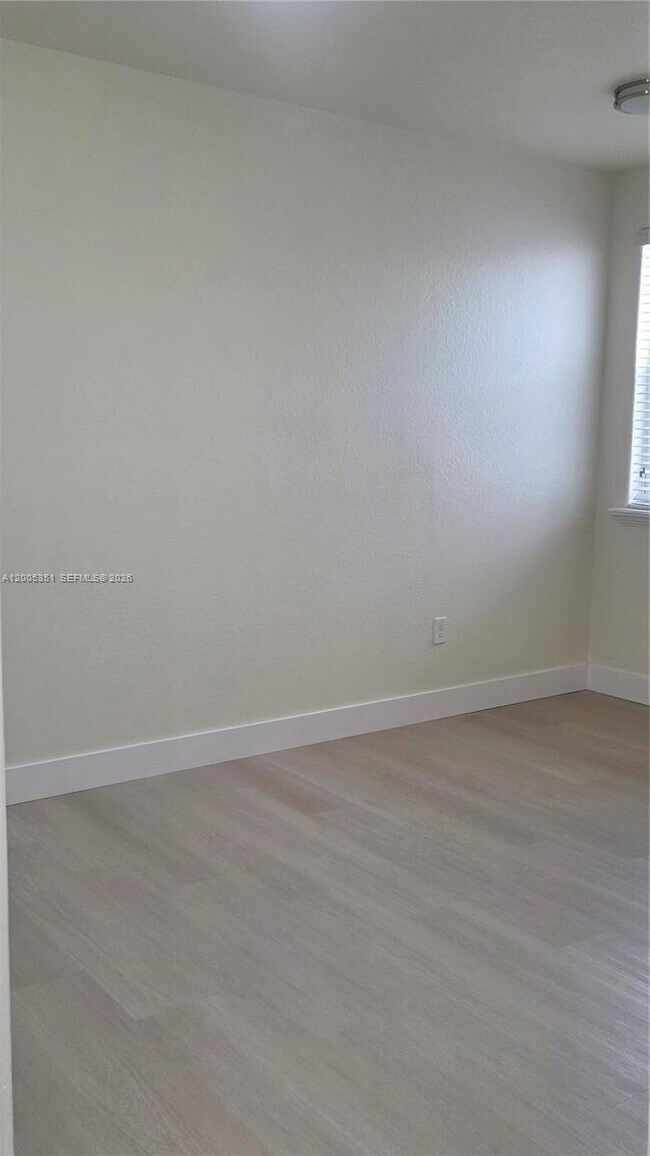 Building Photo - 5440 NW 107th Ave