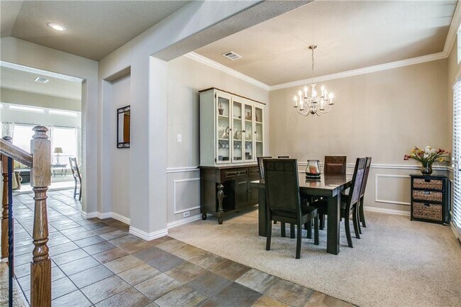Building Photo - Immaculate home on a beautifully landscaped lot, tandem garage, plenty of storage!